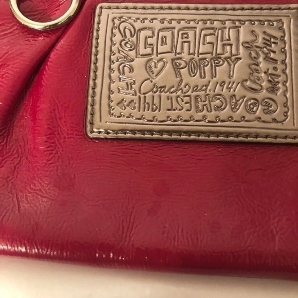 Coach pink patent leather poppy mini bag wristlet